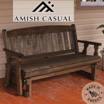 Amish-made Mission-style porch glider bench in dark walnut stain on outdoor porch deck