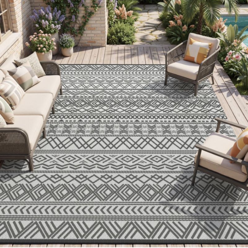 MontVoo Reversible Outdoor Patio Rug 8x10 – Waterproof Boho Plastic Straw Rug | Willow Haven Co grey boho reversible outdoor patio rug under wicker patio furniture